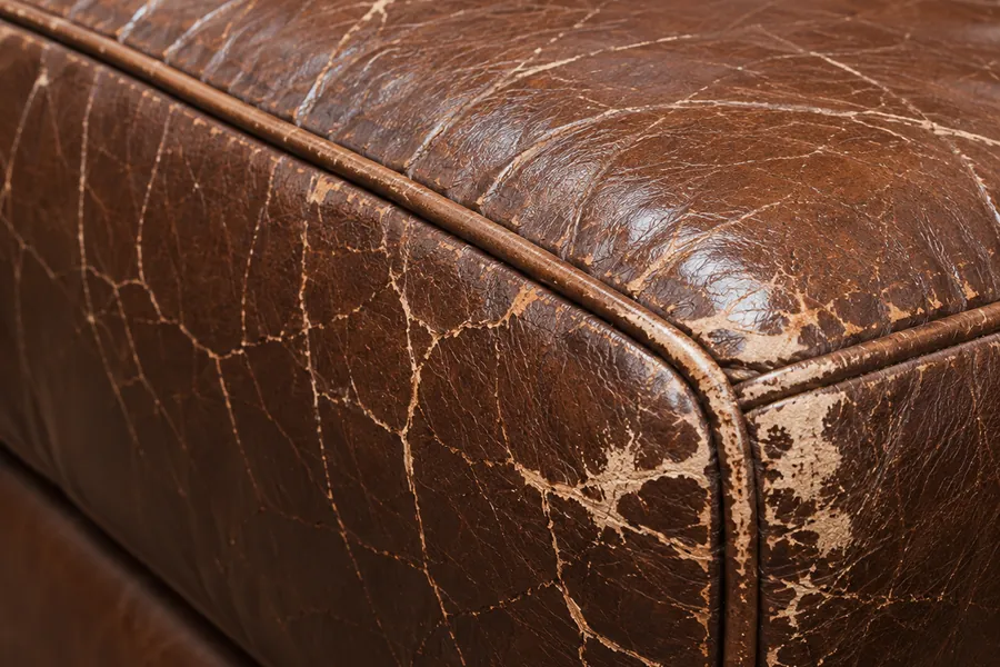 Fine crazing along a leather seat edge