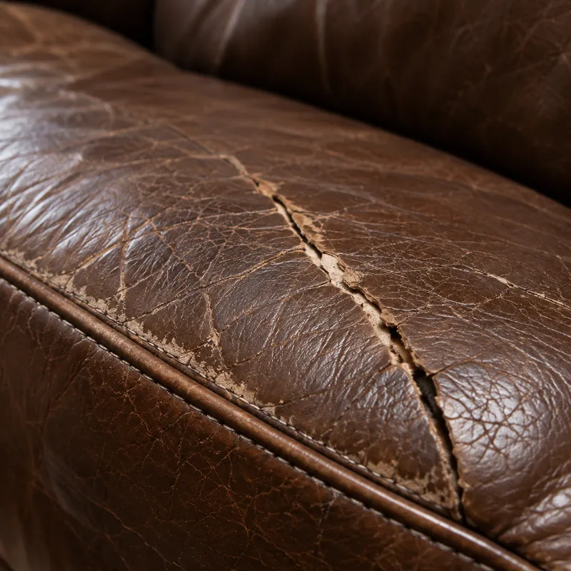 Crack along a brown leather seat