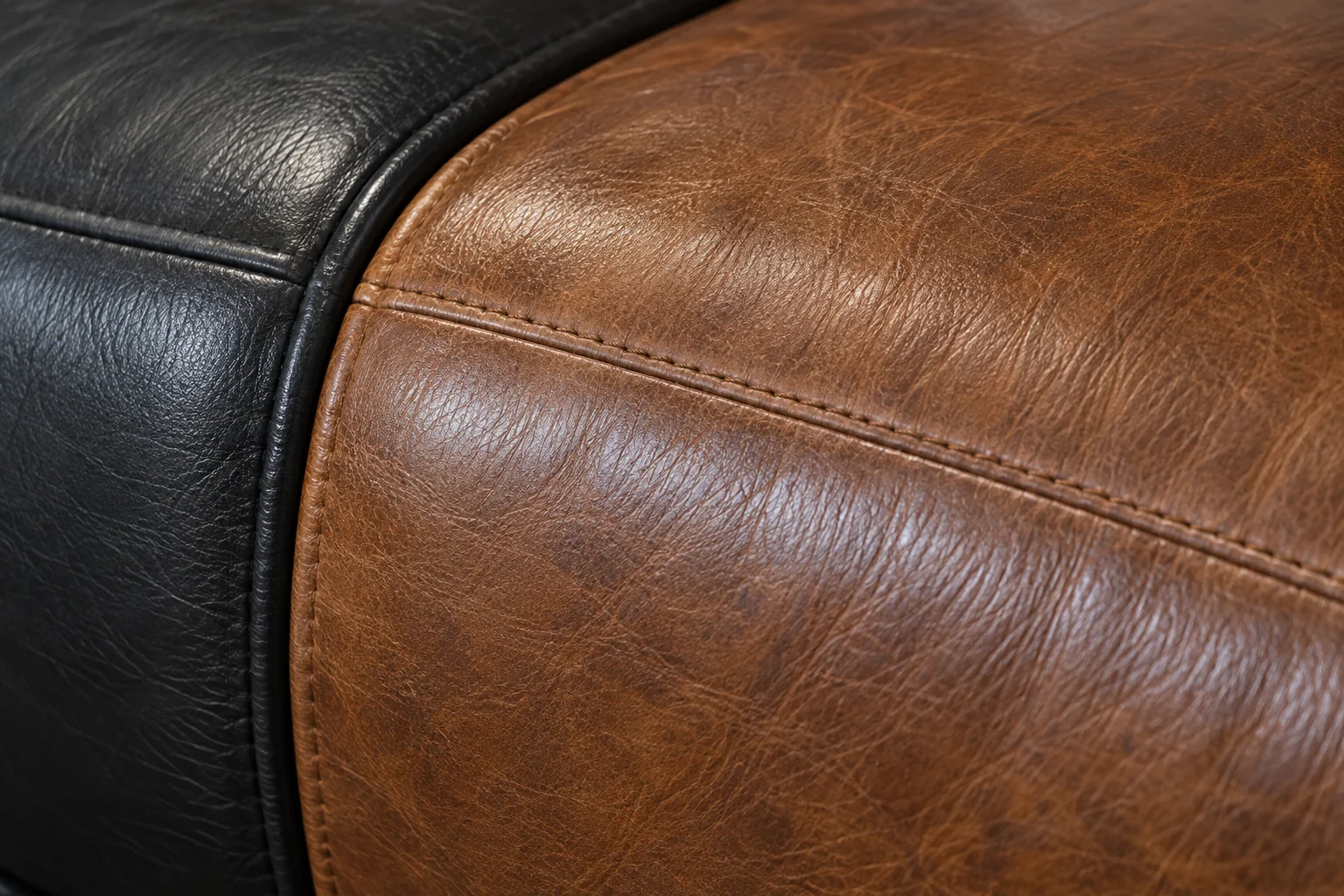 Black and tan leather hides matched side by side