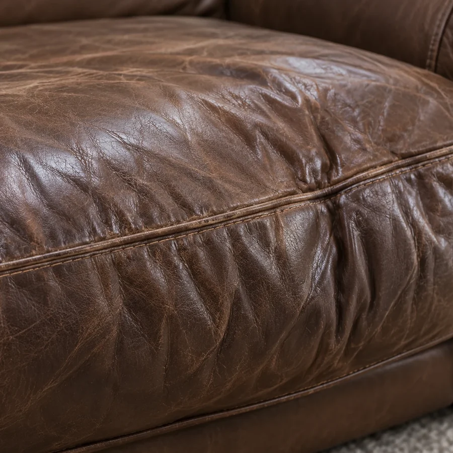 Loose leather upholstery on a cushion
