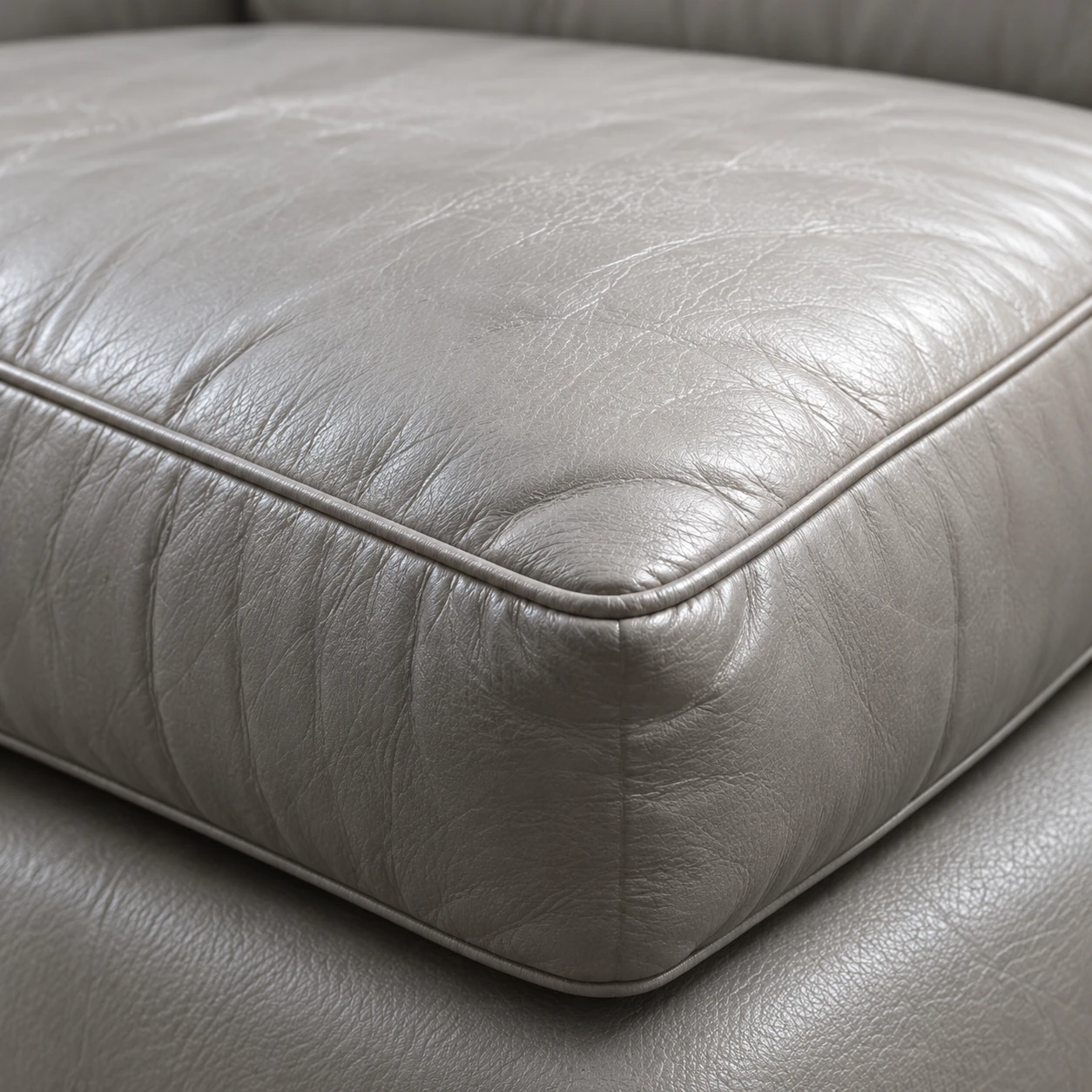 A leather seat cushion that has flattened and lost its shape