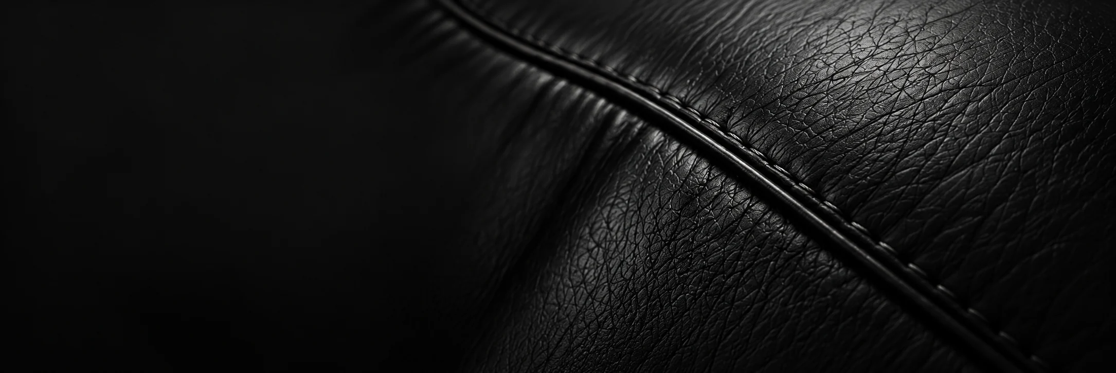 Stitched seam on black leather