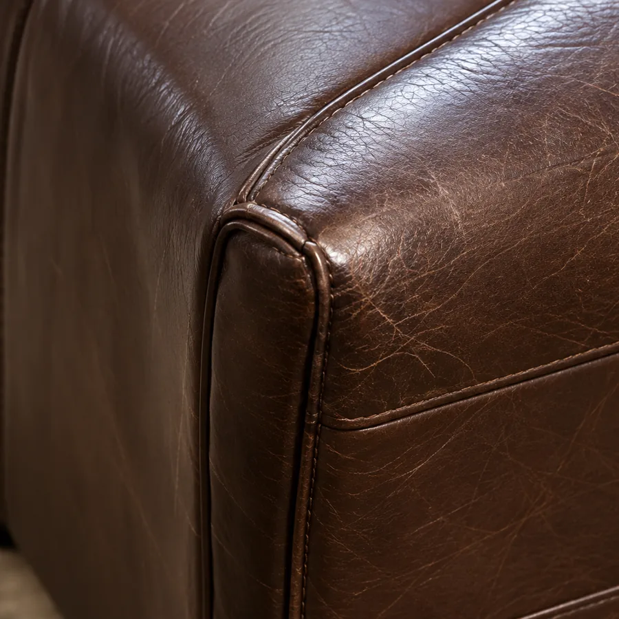 Scuffed outside panel on dark brown leather