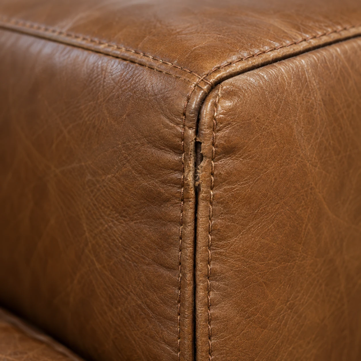 Double-stitched seam on a sectional corner