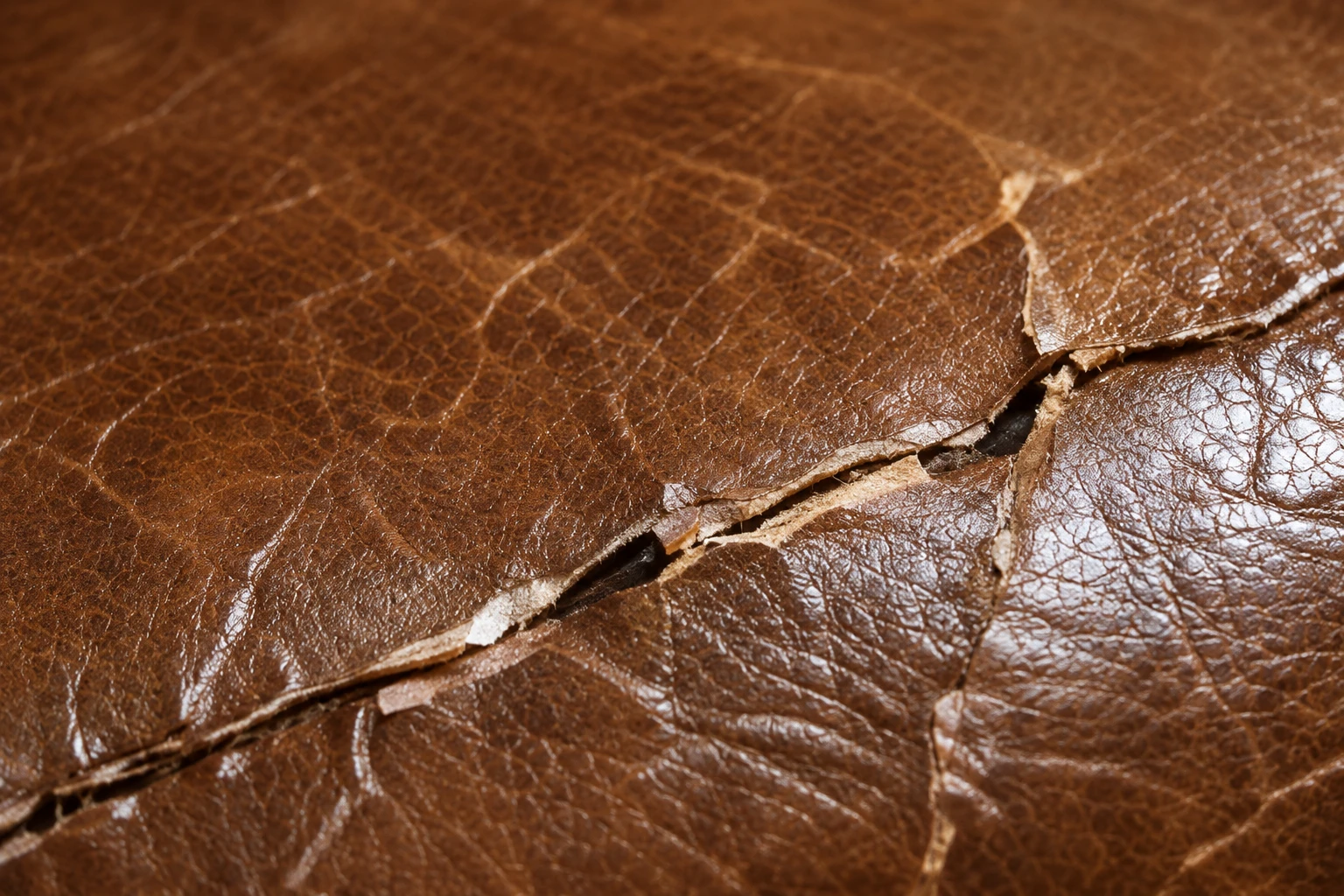 Peeling finish on a leather sofa