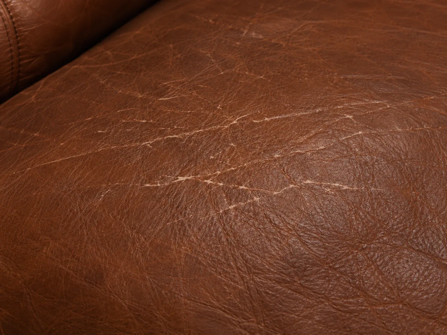 Fine surface scratches on brown leather