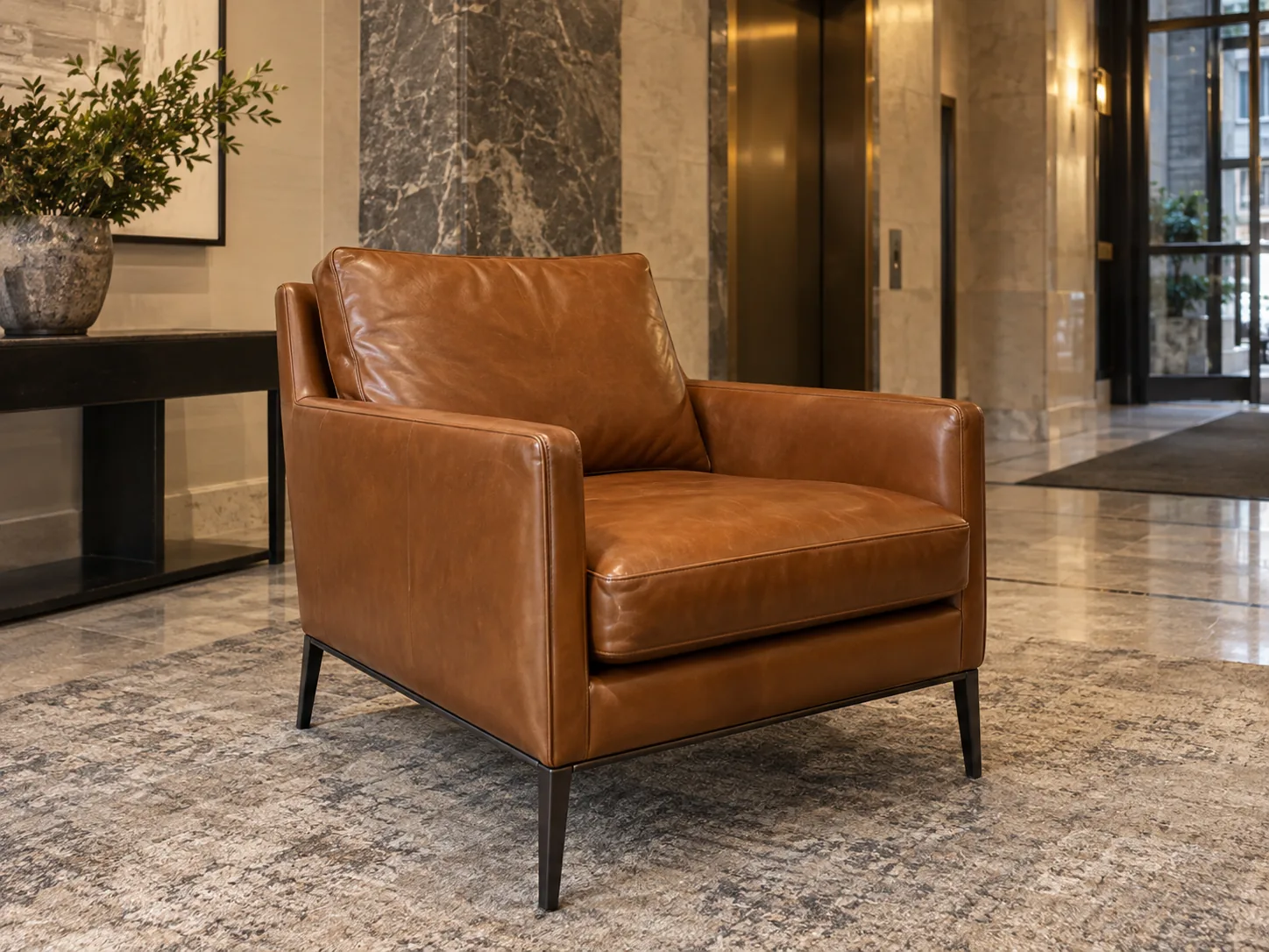 A cognac leather lobby lounge chair