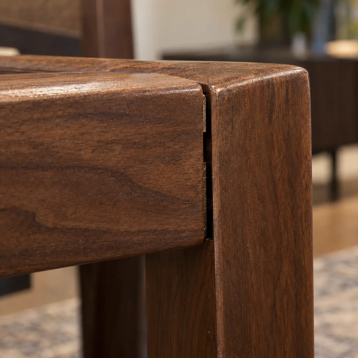 Hairline gap at a walnut chair joint