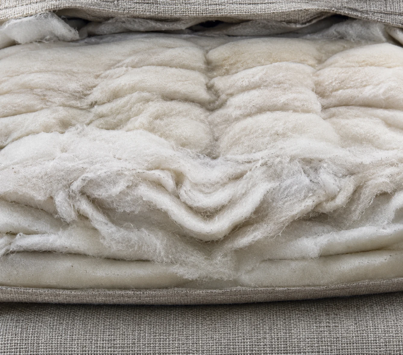 Matted fibre wrap inside a cushion cover