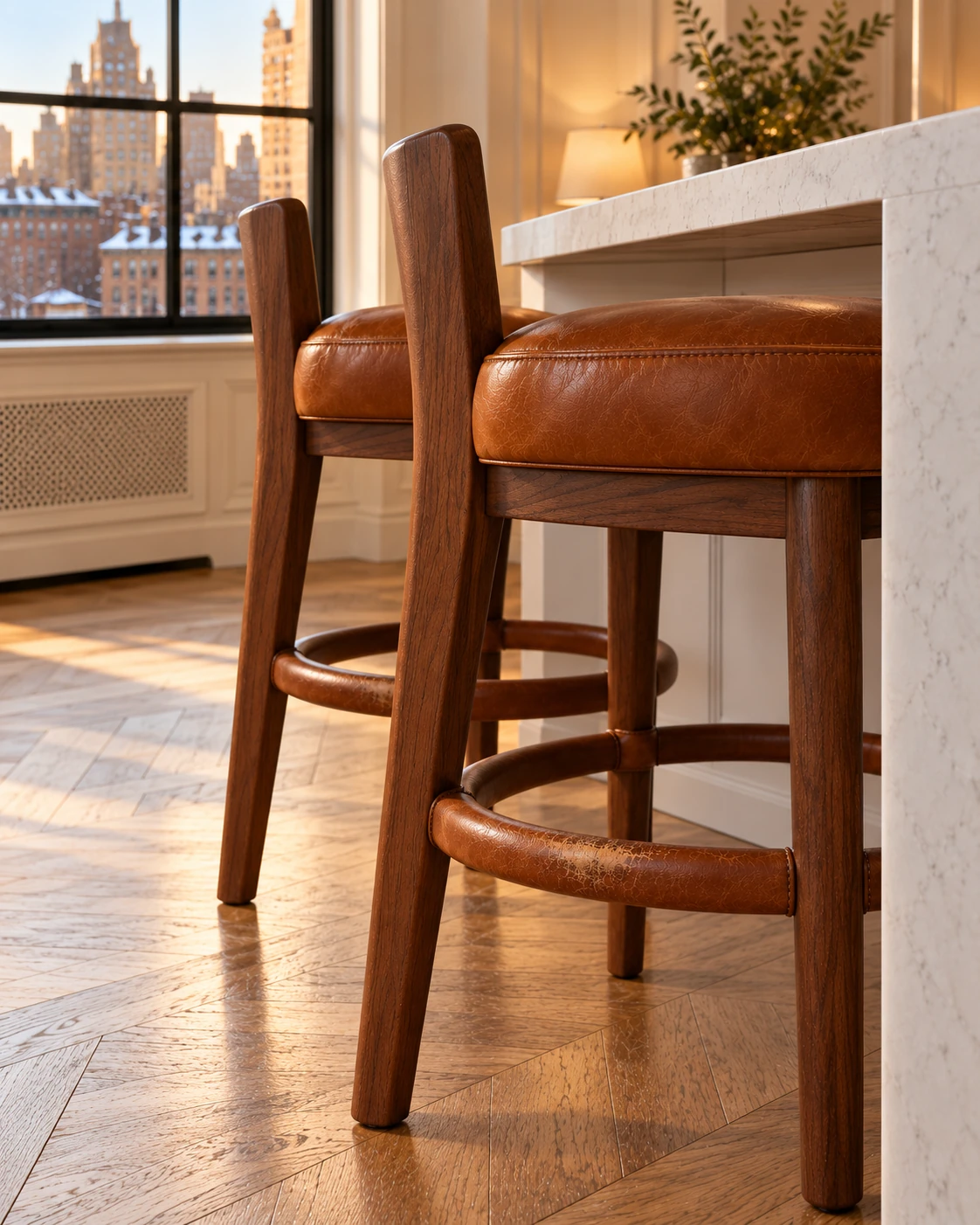 Cognac leather bar stools at a kitchen island