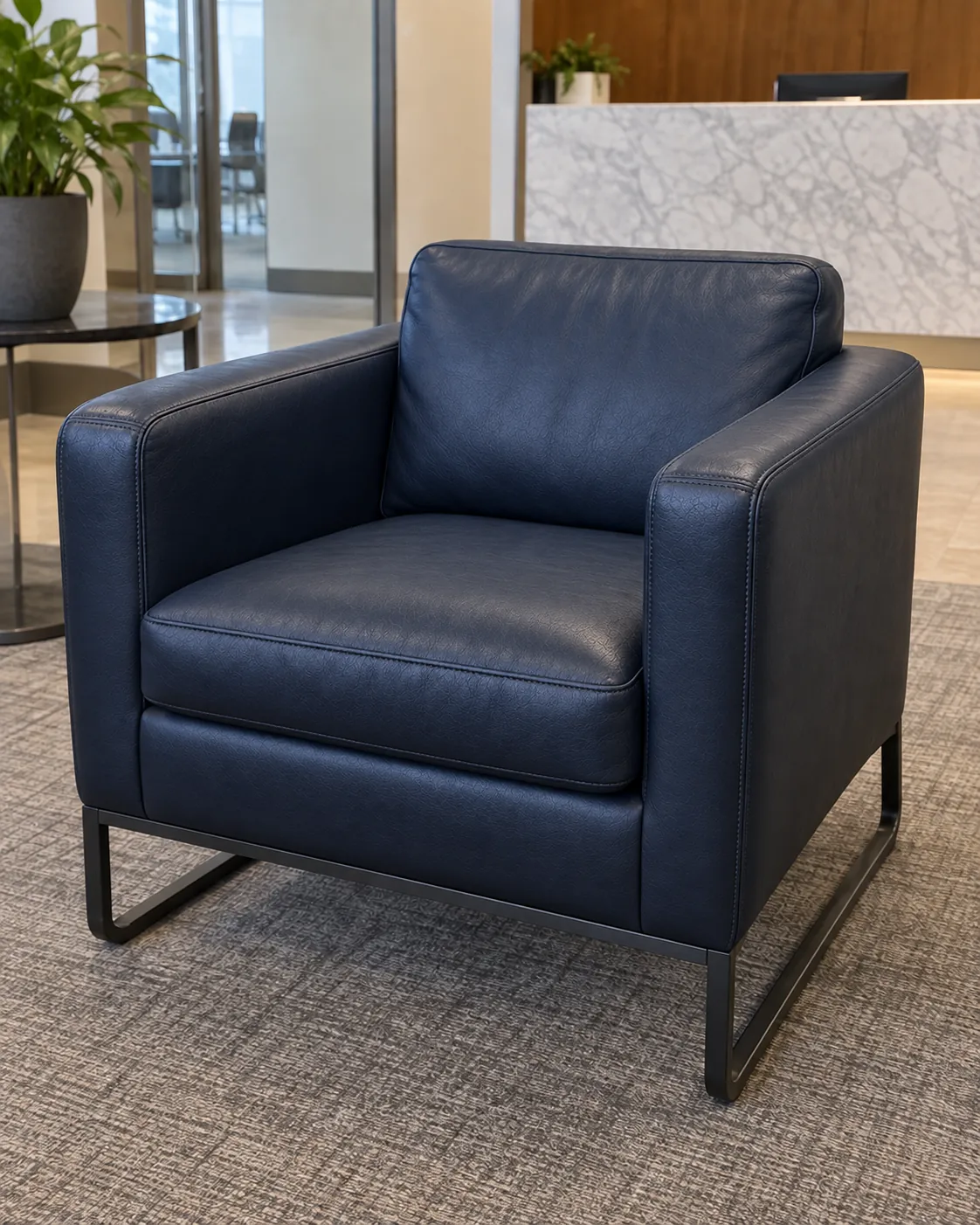 After: the same lobby armchair reupholstered