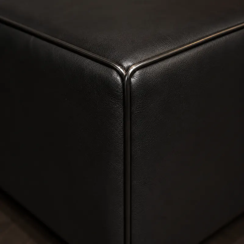 A plain smooth upholstered panel on a nightclub seat