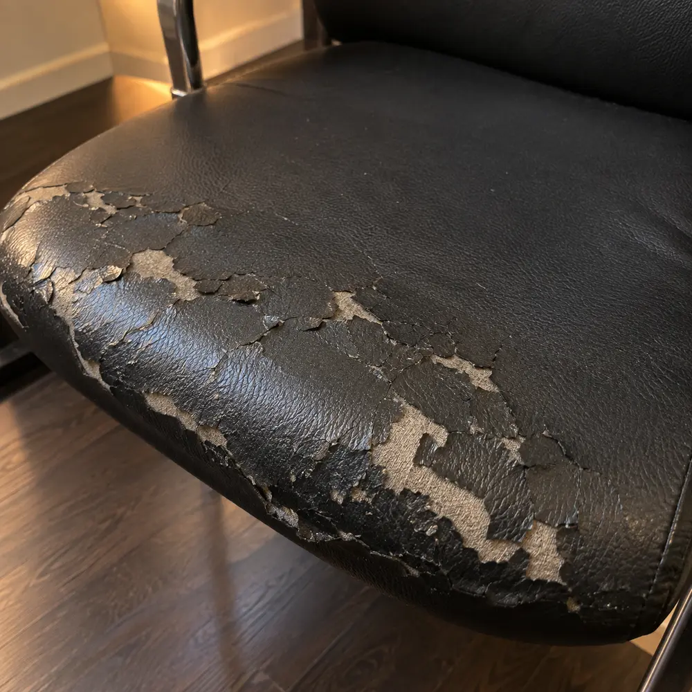 Bonded leather peeling off an office seat