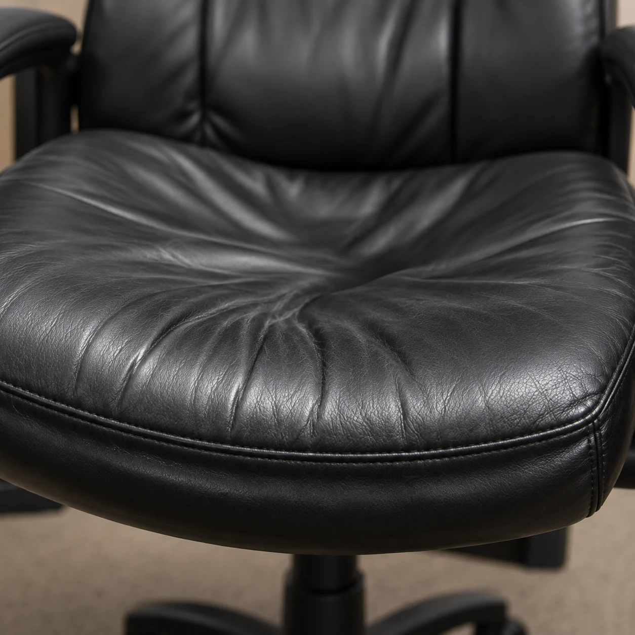 Sagging seat cushion on a leather chair