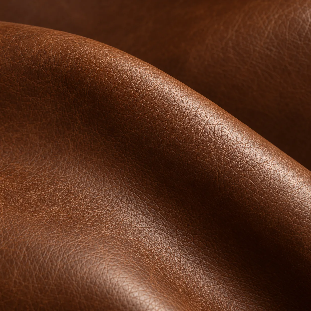 A swatch of cognac pigmented leather for office seating