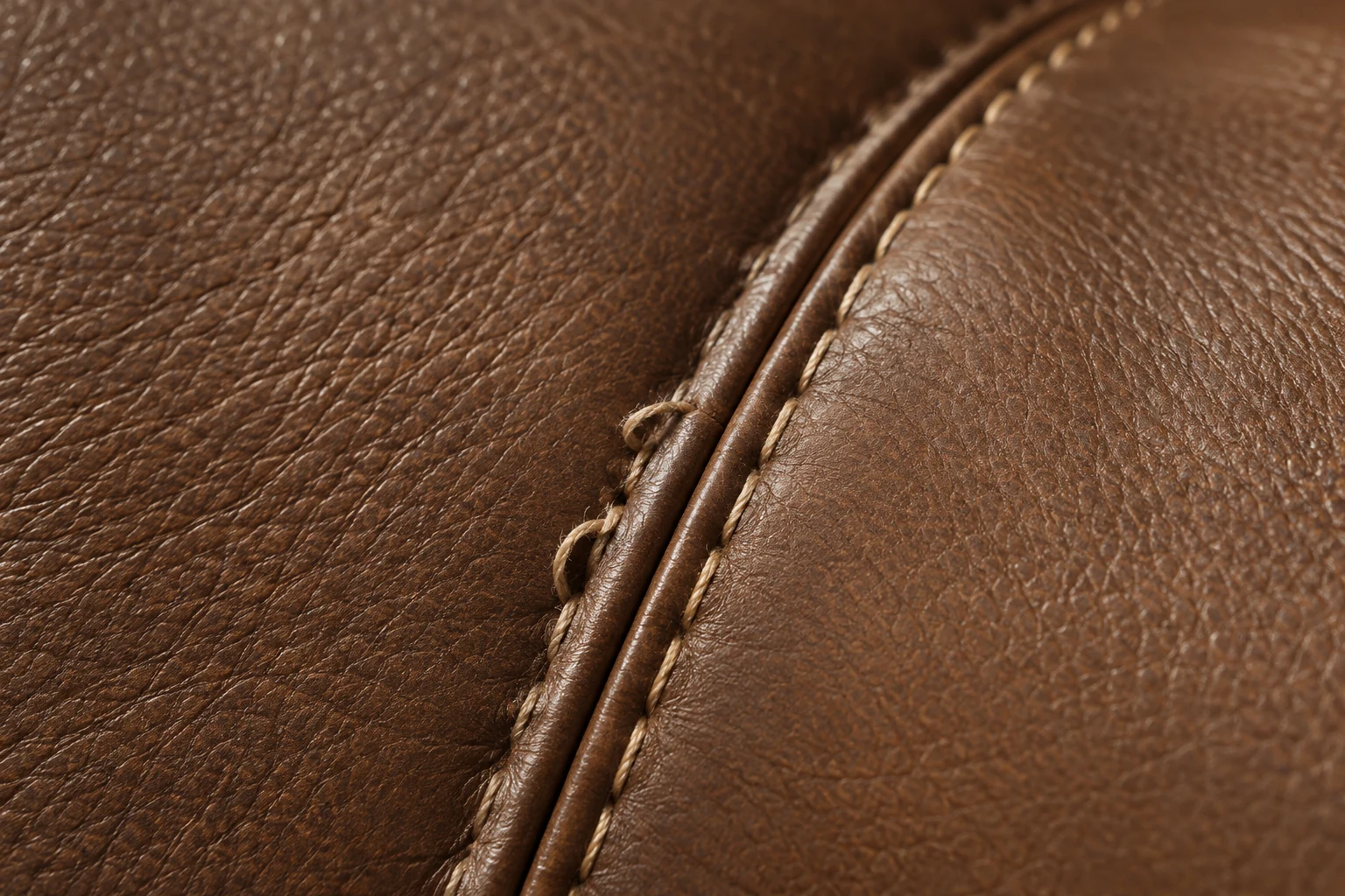 Stitched seam and welt on brown leather