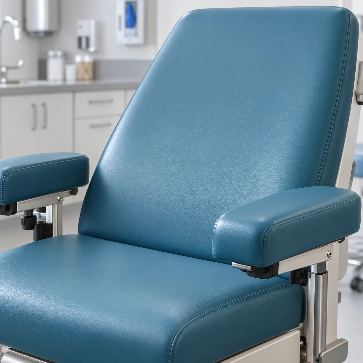 Procedure chair recovered in teal healthcare vinyl