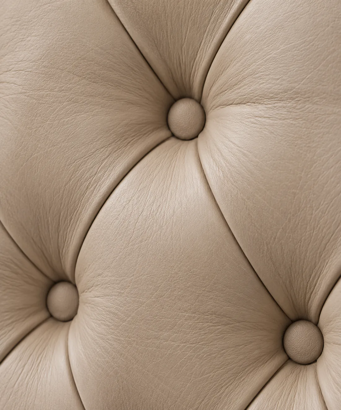 Button tufting on cream leather