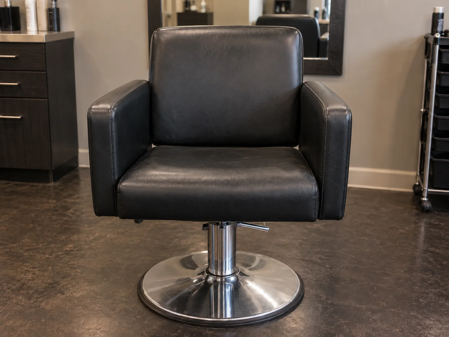 After: the same salon styling chair repaired and refinished