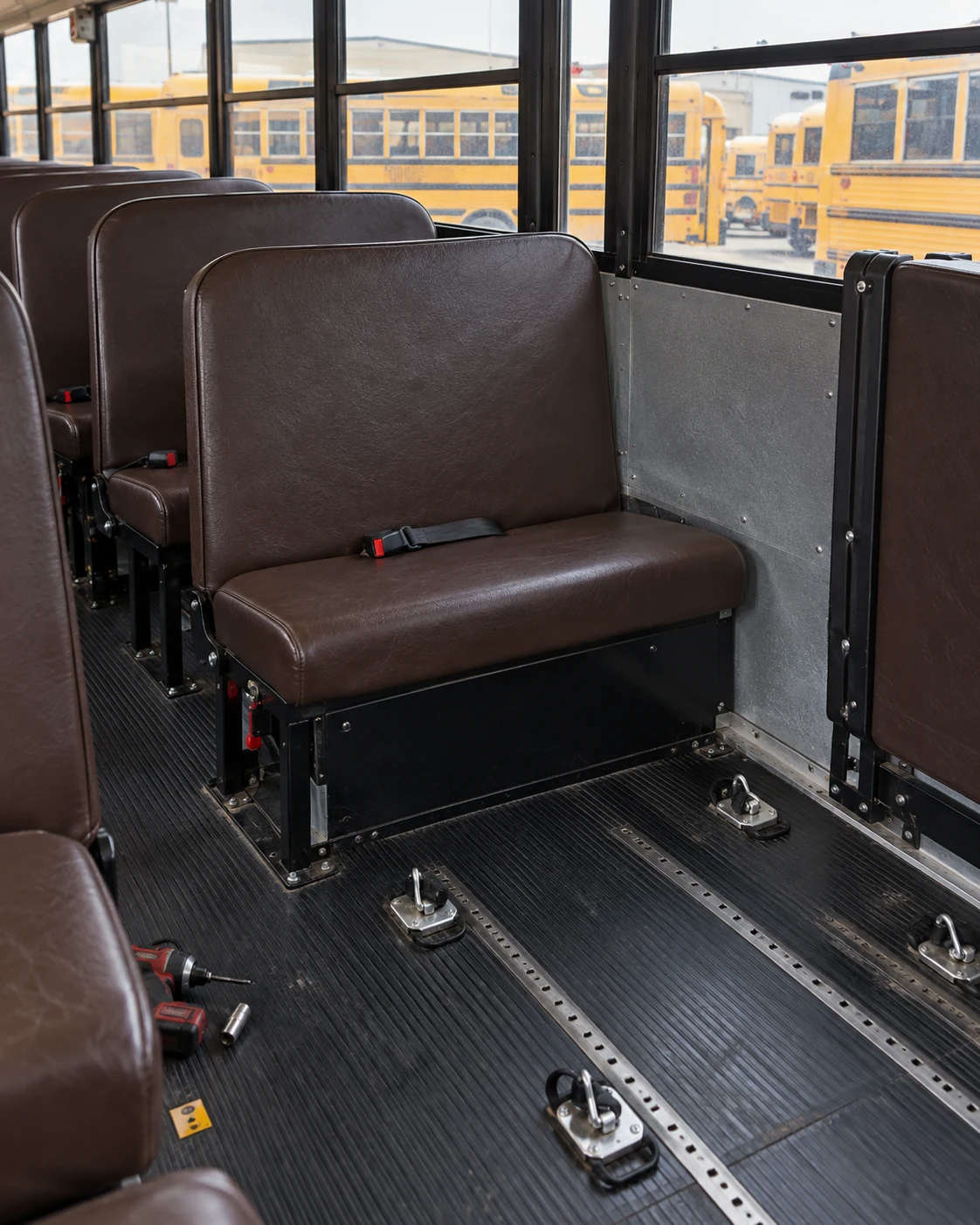 The seat beside a wheelchair position on a school bus