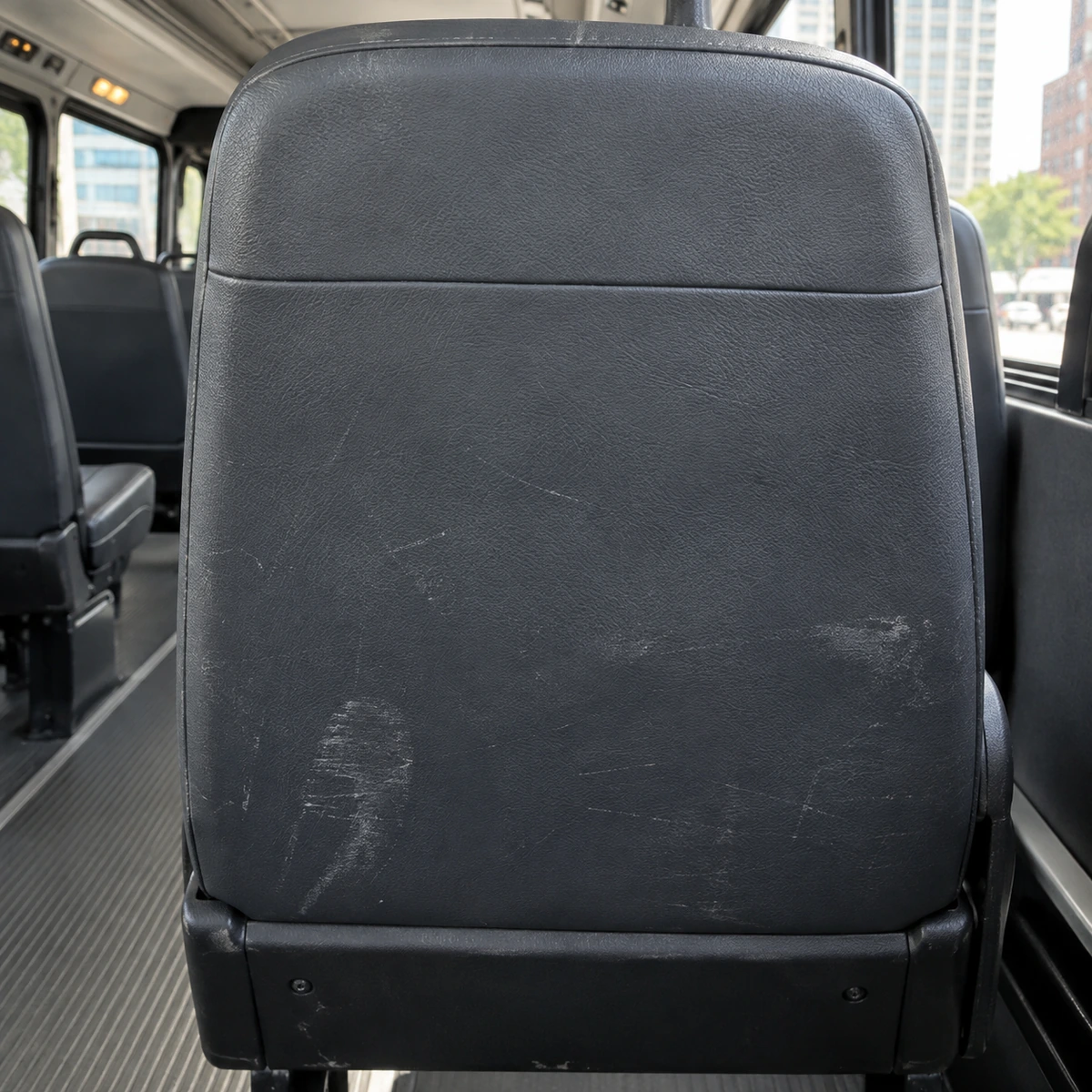 Shoe marks on the back of a vehicle seat