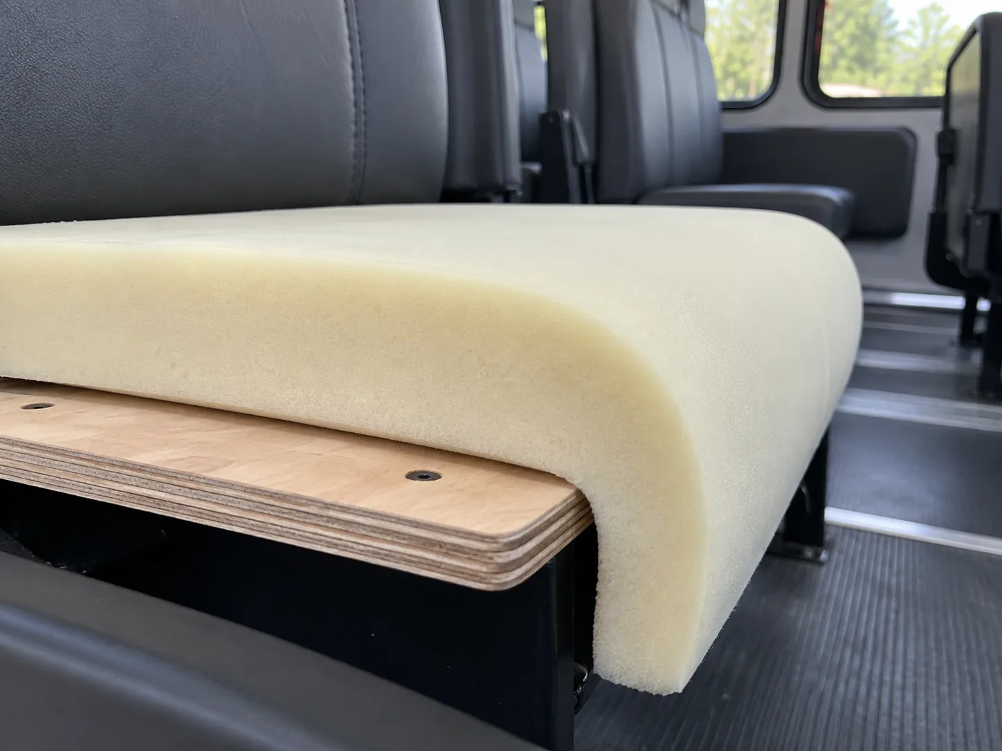 Close view of the shaped front lip where foam turns down over the board