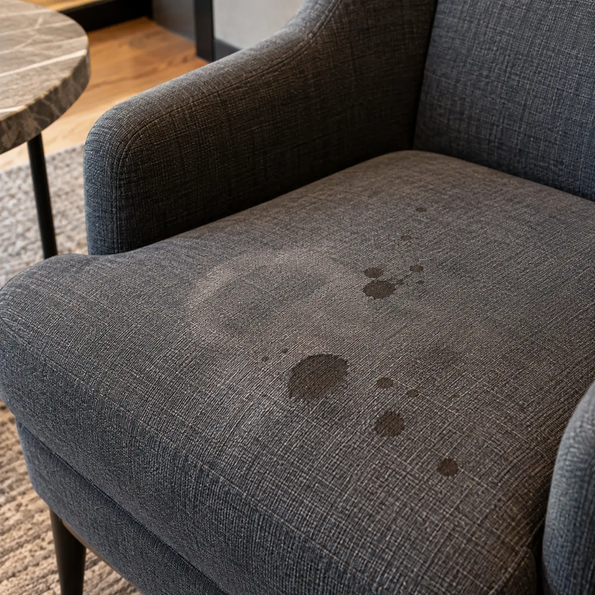 Stains on a grey fabric lounge chair