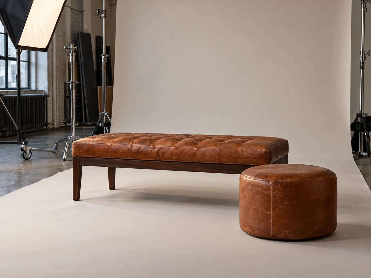 A bench and ottoman used as studio props