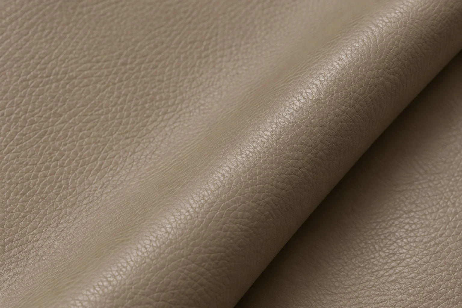 A rolled taupe hide with a fine even pebble grain