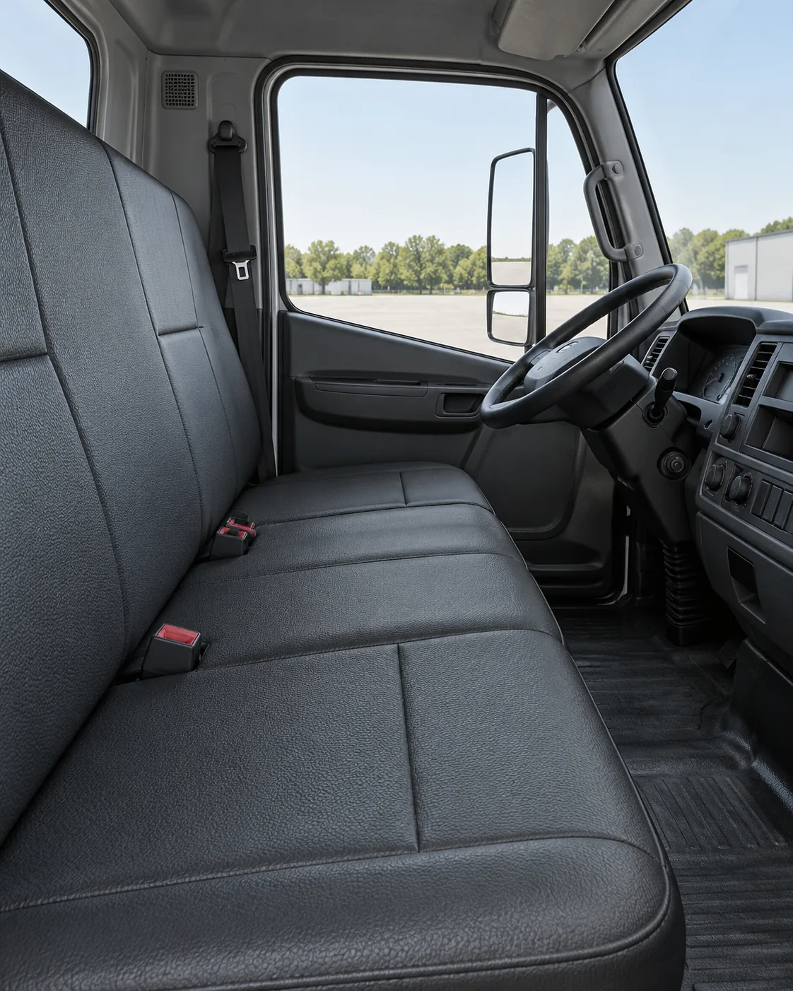The vinyl bench seat inside a truck cab