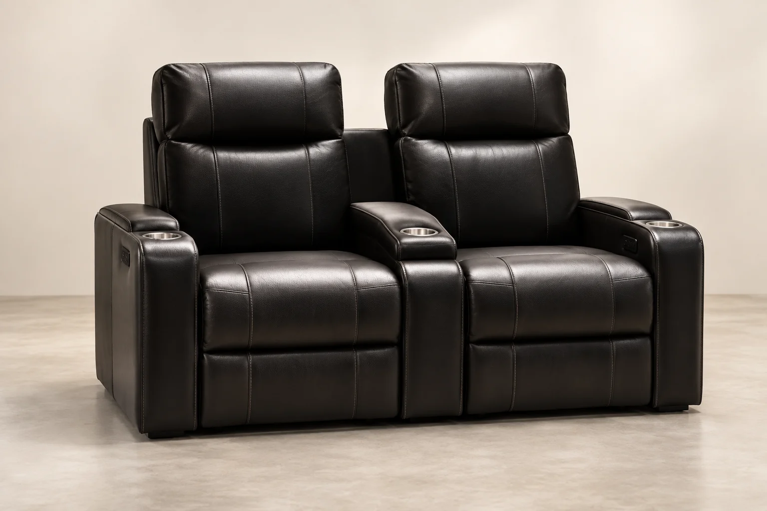 Two-seat home theater loveseat in black leather with a central console