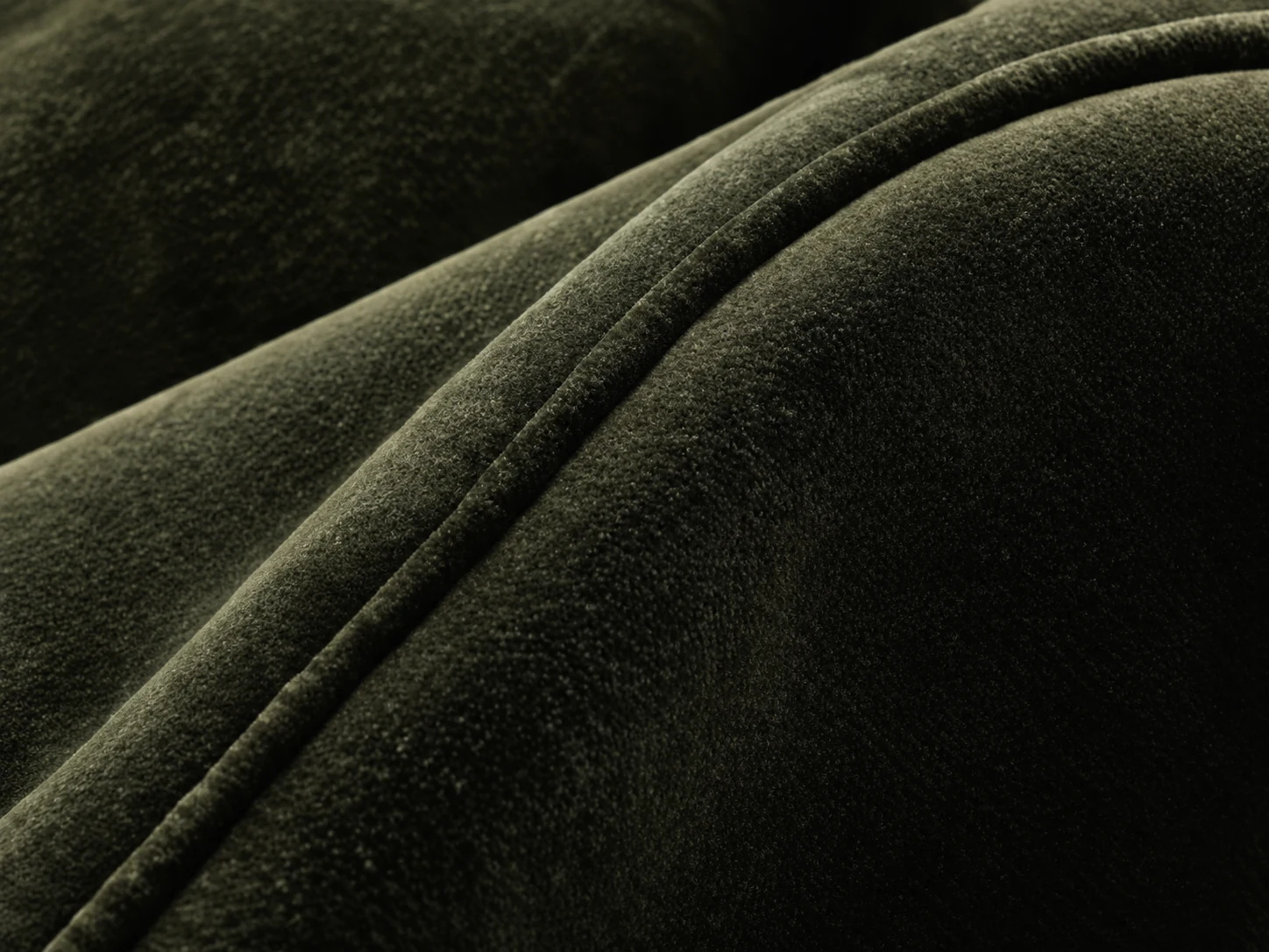 Velvet cushion with piping welt