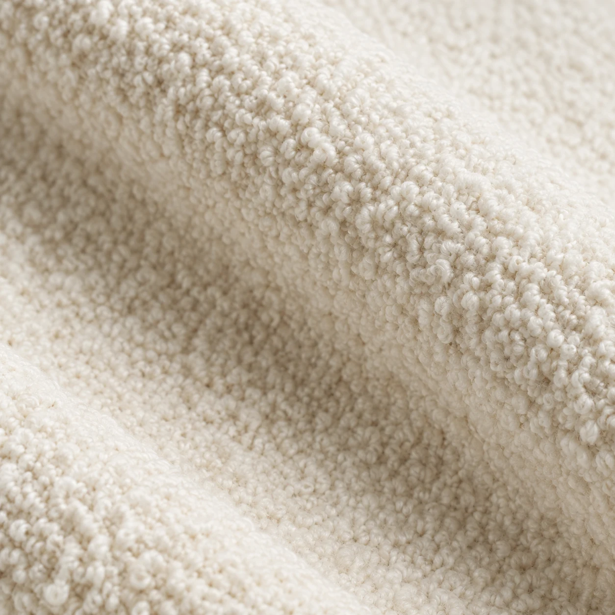 Cream boucle upholstery fabric woven for a custom sofa