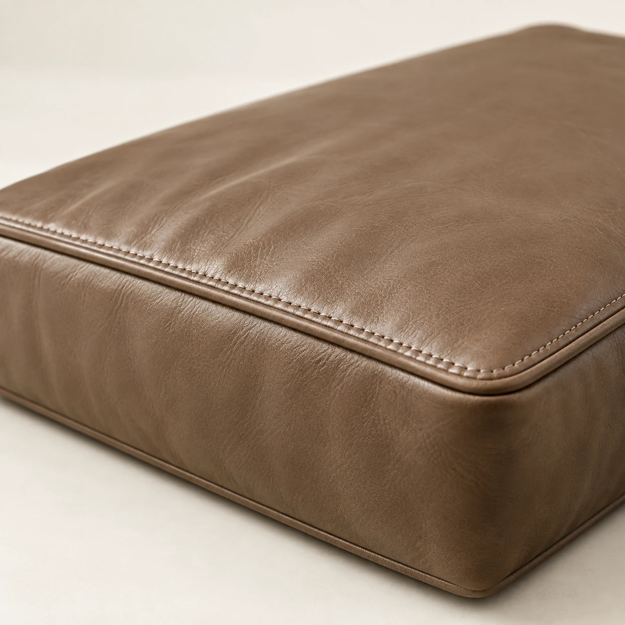 Contract vinyl seat cushion with a welted edge