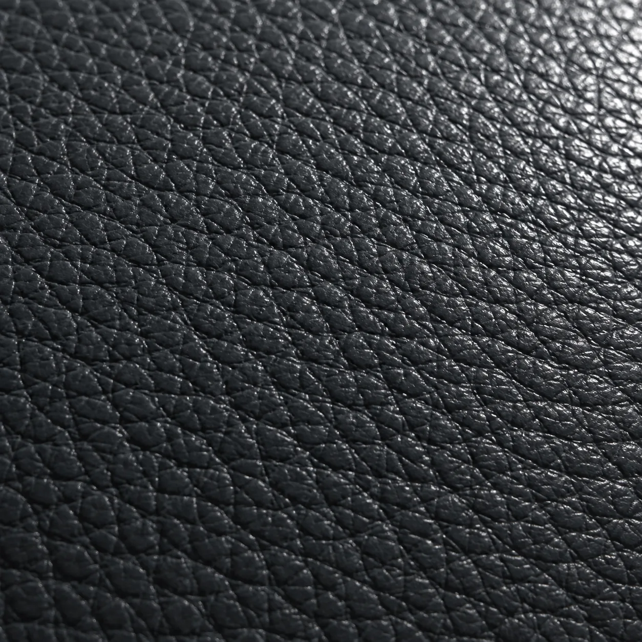 Extreme close view of the clear top coat on dark vinyl