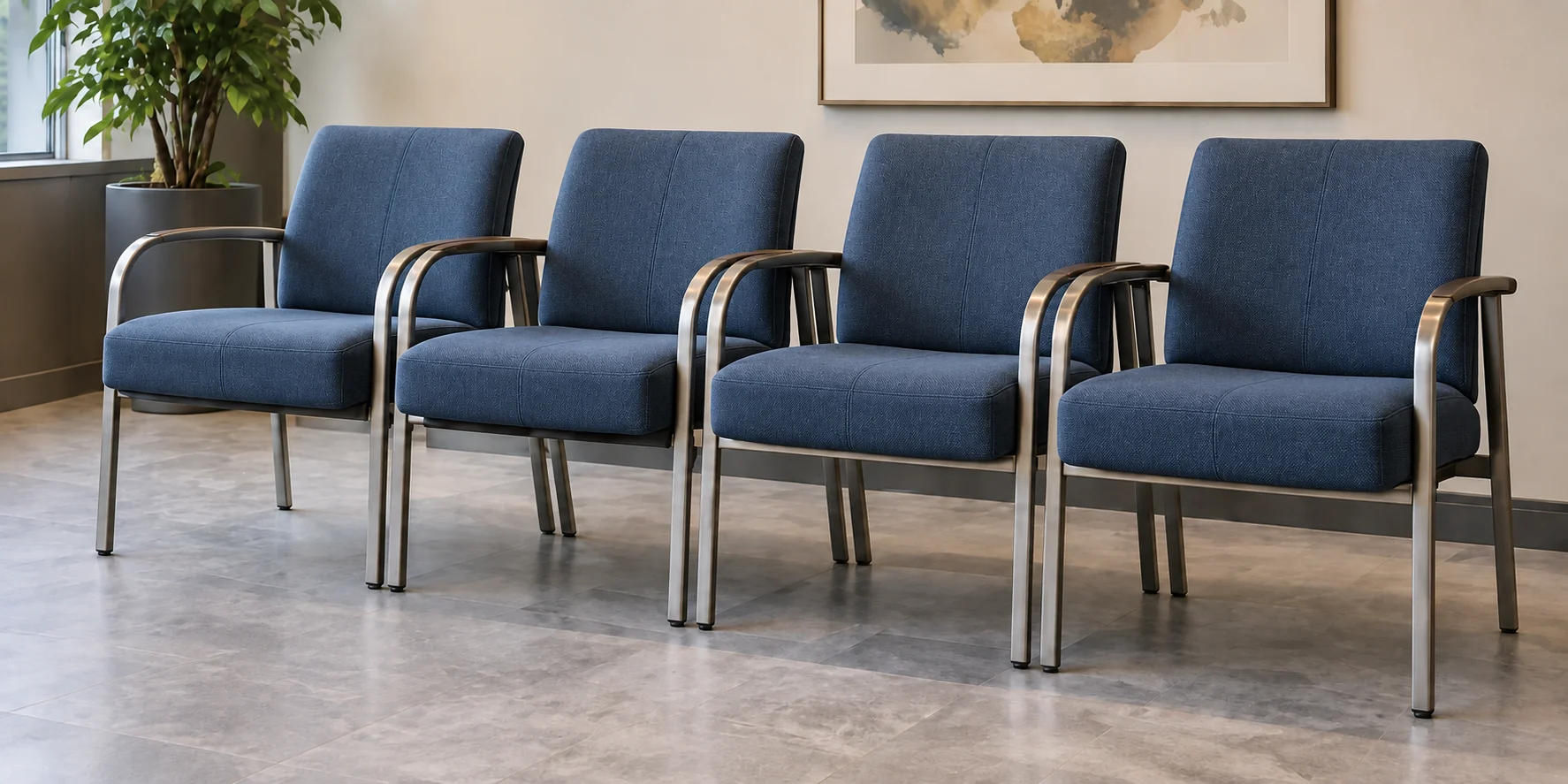 The same row of waiting room chairs after reupholstery in clean navy