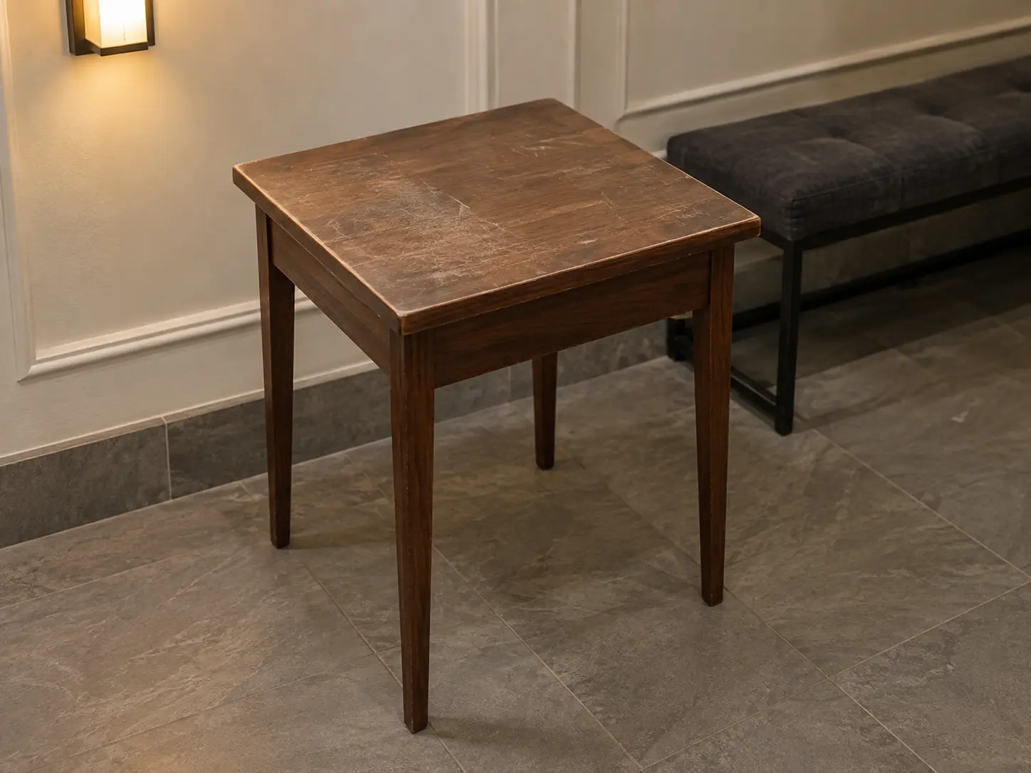 Scratched wood side table