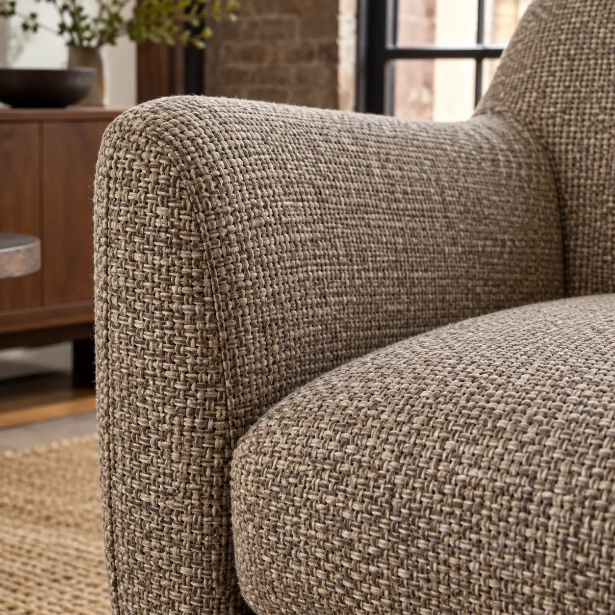 Woven fabric armchair close enough to read the weave
